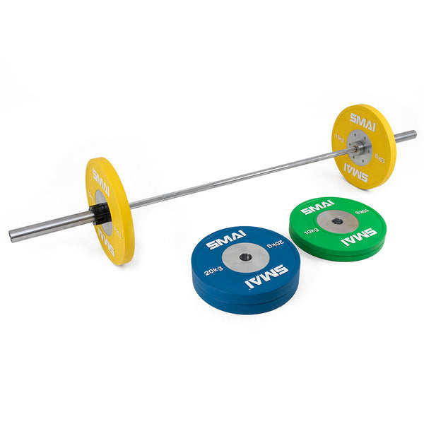 An SMAI-branded Competition Bumper Plate Set, totaling 90 kg, is prepared for Olympic Weightlifting. It includes yellow 15 kg weight plates loaded on a barbell and additional pairs of green 10 kg and blue 20 kg plates nearby. These are ideal companions for Elite Bearing Barbells in any serious lifting session.