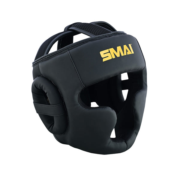 The PRE-ORDER: Gold Series Boxing Headgear - Black/Gold by SMAI features EVA padding at the cheeks, chin, and ears for extra protection, an adjustable strap for a secure fit, and a gold SMAI logo on the forehead.