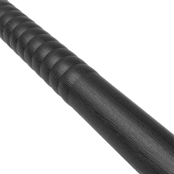 Close up detail of surface texture of a black plastic bo staff