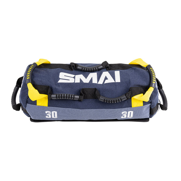 The SMAI Sand Bags - Hybrid Range feature a blue and black design with yellow straps, multiple handles, and "SMAI" plus "30" in white—ideal for strength and endurance training.