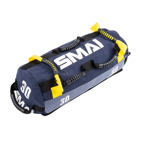The SMAI Sand Bags - Hybrid Range are blue and gray cylindrical bags with "SMAI" and "3D" printed in white, featuring multiple black and yellow handles for versatile grips—perfect for strength and endurance workouts.