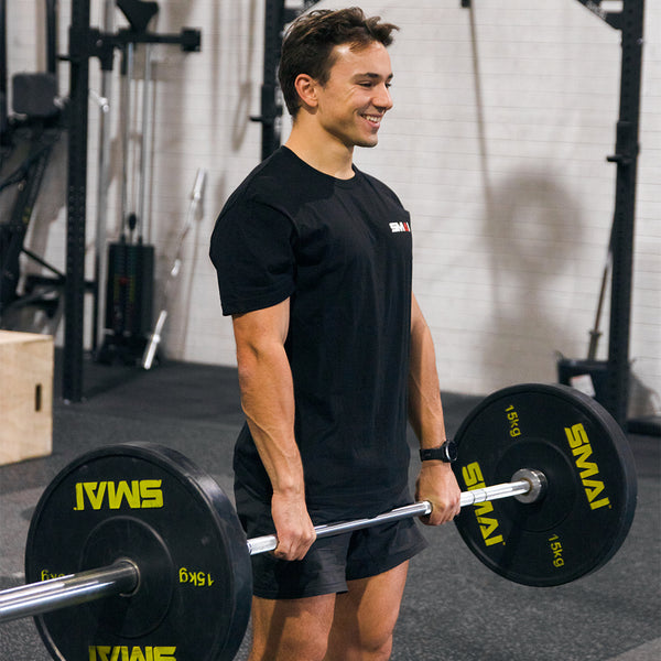 Man deadlifting HD Bumper Plates (Pair) - 15kg