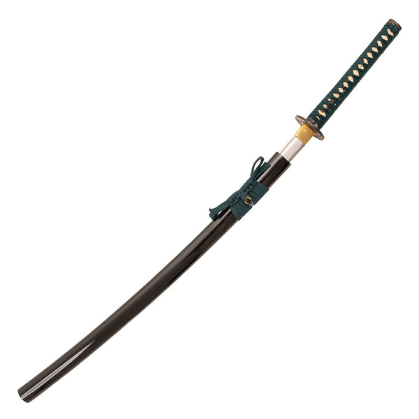 The SMAI Katana - Medium Carbon Emerald features a medium carbon steel blade, black scabbard, green-wrapped handle, decorative guard, and a tied cord near the hilt.