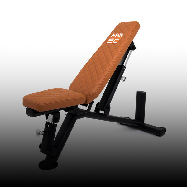 Adjustable gym bench with a black metal frame and brown, quilted leather padding. The backrest features a white logo, and the bench is set against a white-to-black gradient background.