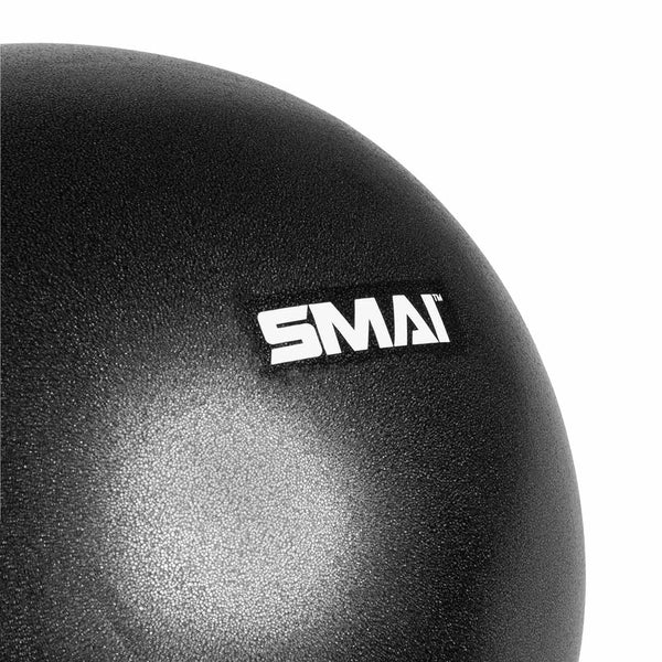 Close-up of a black Pilates Ball by SMAI, ideal for balance training, with the brand logo prominently displayed in white near the top right of the image.