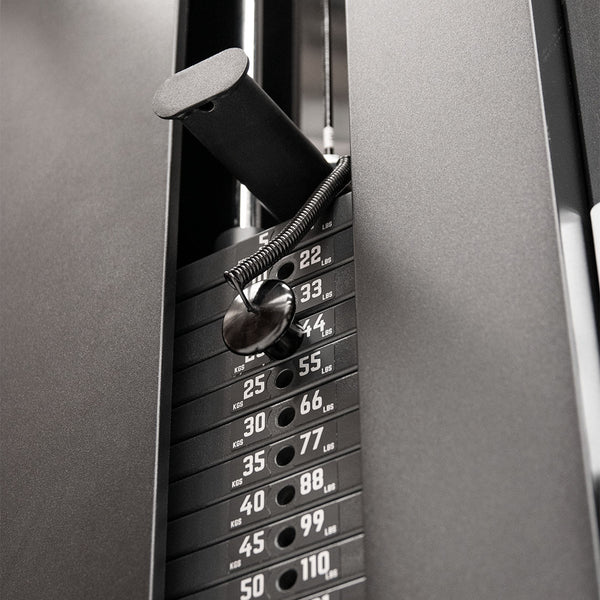 Free Standing Cable Tower Lat Pull / Low Row Close up of band peg and weight stack