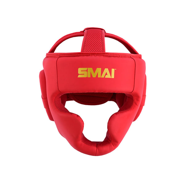 The SMAI PRE-ORDER: Gold Series Boxing Headgear - Red/Gold features multi-layer EVA protection, cheek/chin/top padding, an open face design, and "SMAI" in yellow on the front—ideal for fighters seeking premium headgear.