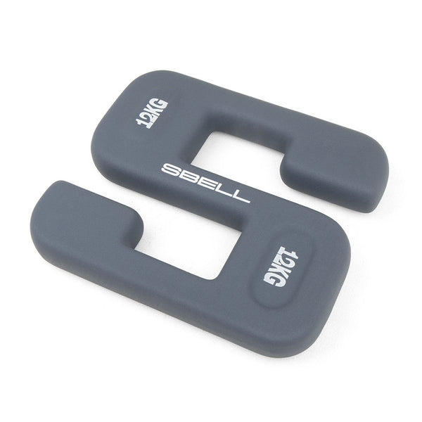 Two gray rectangular weight plates, known as the SBELL Midnight 12kg by No Sync To Channel Engine, each marked with "12KG" and "SBELL," feature wide rectangular cut-outs in the center for easier handling. Perfect for strength and conditioning sessions, they are an ideal addition to any commercial gym.