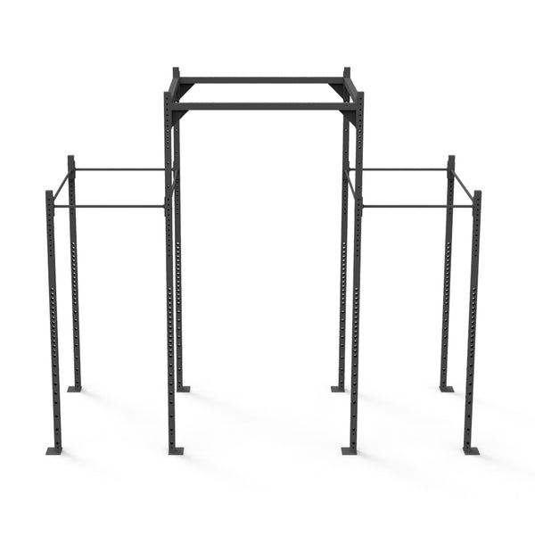 The "Rig - 4 Squat Cells with Utility Bridge - X-Frame" by No Sync To Channel Engine is a spacious, black, metal workout rig featuring multiple bars and adjustable height. Built with a sturdy frame reminiscent of commercial equipment, its modular design makes it ideal for fitness and strength training exercises. It stands out prominently against a plain white background.