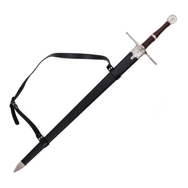The SMAI Medieval Sword - Witch Hunter Deluxe features a brown hilt, silver crossguard and pommel, and a black scabbard with silver details and carrying strap—perfect for cosplay or as a striking display broadsword.