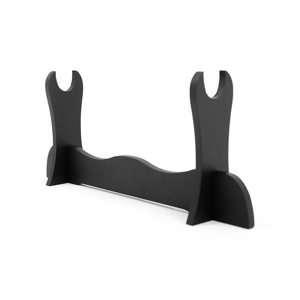 The SMAI Single Sword Display Stand features two upright supports and a curved base to hold one sword horizontally, finished in sleek black for an elegant display.
