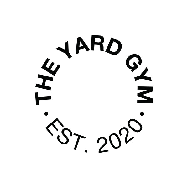 Black text in a circular shape on a white background reads “THE YARD GYM • EST. 2020,” with the words curving around the center, forming an empty circle.