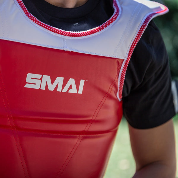 Taekwondo Chest Guard - Reversible Man wearing red side