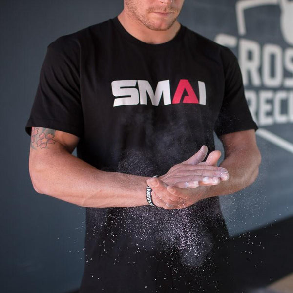 Crossfit Games athlete using SMAI Sports Chalk.