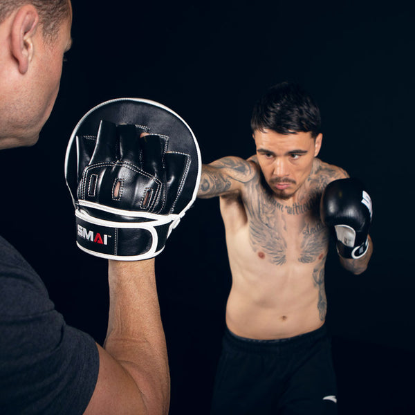 George Kambosos jr punching the SMAI Essentials Boxing Mitts