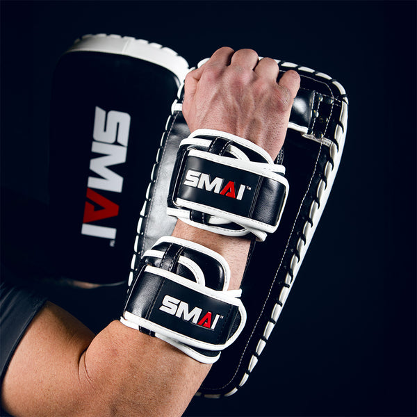 Man Holding Essentials Muay Thai Pads