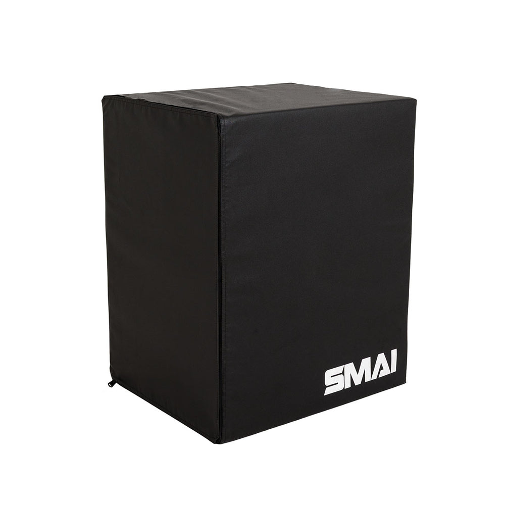 Introducing the SMAI Plyometric Box - Foam Covered - Black Series: featuring a sleek black, rectangular design with the white “SMAI” logo printed on the bottom right corner, this plyo box offers safe, effective support for box jumps and is engineered to take your training sessions to the next level.