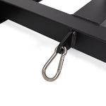A silver metal carabiner clip attached to a black rectangular metal bar with a small loop, set against a white background—perfect for securely attaching the SMAI Tower Gym Sled - Hybrid Series during intense workouts.