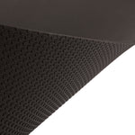 A close-up of the SMAI Exercise Mat - Extra Large (200cm x 122cm) is shown at an angle on a white background, featuring black textured rubber with a dotted pattern.