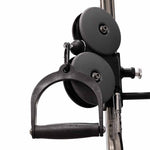 Close-up of the SMAI Functional Trainer - FTS Slide’s cable pulley system, shown with a single black handle attachment. This commercial-grade unit is widely used for strength training exercises in gyms and typically features dual weight stacks—an essential element in a functional trainer setup.
