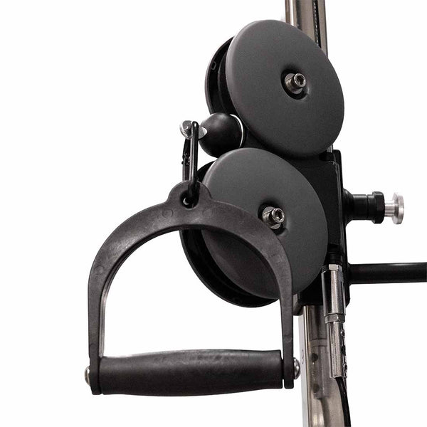 Close-up of the SMAI Functional Trainer - FTS Slide’s cable pulley system, shown with a single black handle attachment. This commercial-grade unit is widely used for strength training exercises in gyms and typically features dual weight stacks—an essential element in a functional trainer setup.