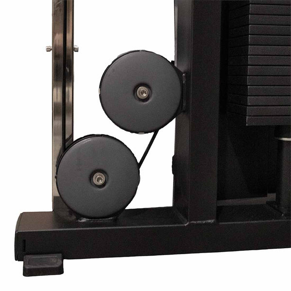 Close-up of two black pulleys and part of a weight stack on the SMAI Functional Trainer - FTS Slide, highlighting the commercial-grade cable system used for lifting weights during exercise.