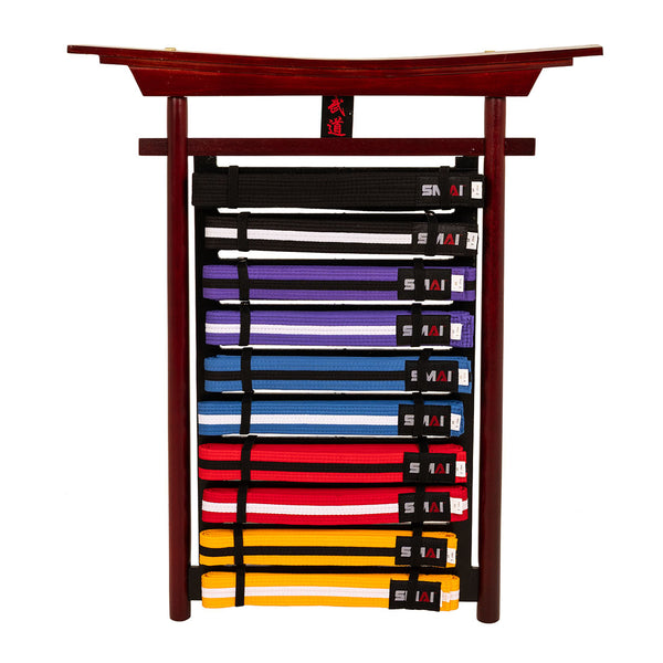 The SMAI Belt Display - Bushido Design is a wooden torii gate-shaped holder for ten martial arts belts from white to black, perfect for showcasing your achievements and representing your belt levels elegantly.