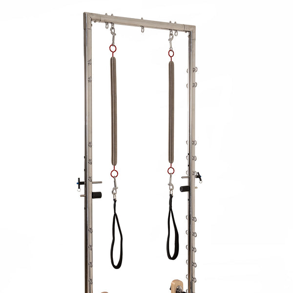 The SMAI Pilates – Classical Maple Reformer with Tower features a sturdy frame and two sprung handles, ideal for versatile strength and flexibility training in any commercial or home studio.