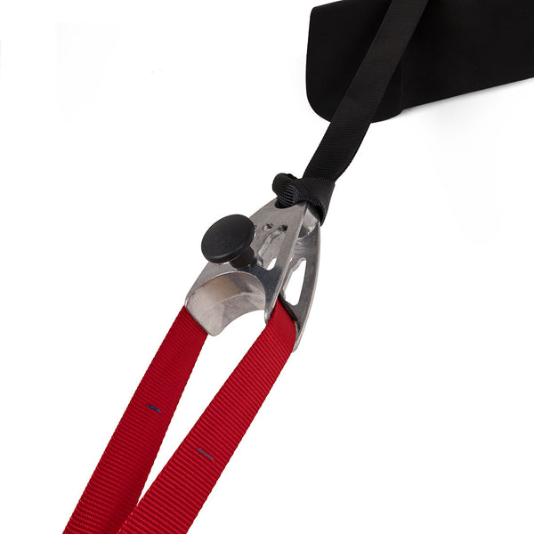 A close-up of a metal cam buckle securing a black and red strap, set against a white background—the adjustable Suspension Trainer - SES from SMAI, designed for balance training.