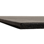 Close-up side view of a single SMAI EPDM Rubber Gym Flooring Tile - 15mm - Black, highlighting its thickness and slightly textured black surface against a white background.