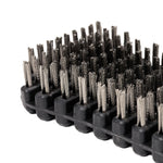 Close-up of the SMAI Barbell Cleaning Brush - Steel, a rectangular black brush featuring tightly packed, stiff steel bristles, photographed against a white background. Designed for barbell maintenance, this brush efficiently removes chalk and grime from lifting equipment.