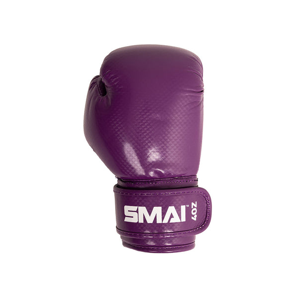 The SMAI Essentials Kids Boxing Glove in purple, featuring a textured surface and a wrist strap labeled “SMAI 4oz,” is shown on a white background—making it an excellent choice for anyone seeking quality kids boxing gloves.