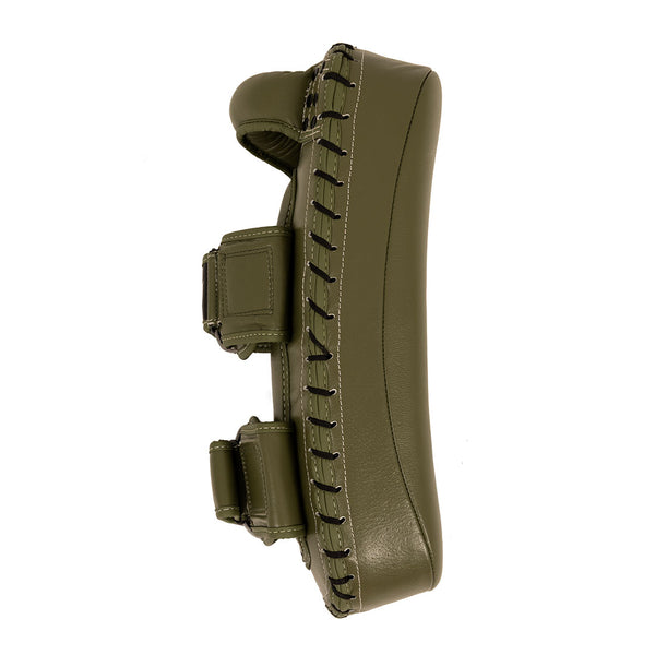 A pair of SMAI Thai Arm Pads V2 in olive green, crafted from high grade leather with thick black stitching and two adjustable straps, featuring a layered foam interior for added comfort, displayed side by side against a white background.