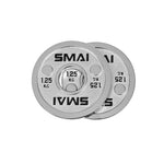 Two polished silver SMAI Calibrated Steel Change Plates, each marked 1.25 kg, are shown overlapping on a white background. These plates from SMAI are designed with a central hole for easy loading onto a barbell and are perfect for making precise weight adjustments during powerlifting training.