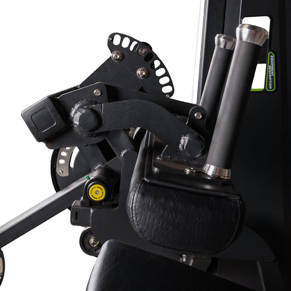 Close-up of the arm and handle components of the SMAI Leg Extension / Leg Curl Machine – 2 in 1, highlighting black padded grips, adjustment knobs, metallic levers, and bolts against a black background.