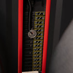 A close-up of the weight stack on the SMAI Leg Extension / Leg Curl Machine - 2 in 1, with clearly labeled weights in pounds and kilograms and the pin set at 44 lbs (20 kg), framed by the red and black structure of this commercial gym equipment.