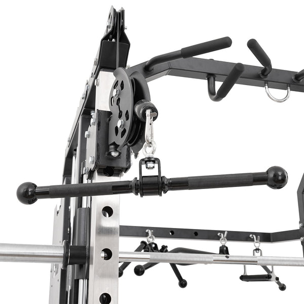 Close-up of the SMAI All in 1 Functional Trainer, featuring a pulley system, pull-up bars, and a lat pulldown bar with multiple handles for commercial-grade strength training.