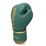 The Gold Series Boxing Glove - Green/Gold by SMAI features a green design with gold trim and the "SMAI" logo printed in gold on the wrist and side. Enhanced wrist support is included, and the glove is displayed upright against a white background.