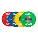 A row of four Competition Bumper Plates from the SMAI brand showcases vibrant colors - red (25kg), blue (20kg), yellow (15kg), and green (10kg) - each featuring silver-centered holes that perfectly accommodate bearing barbells, ideal for Olympic weightlifting.
