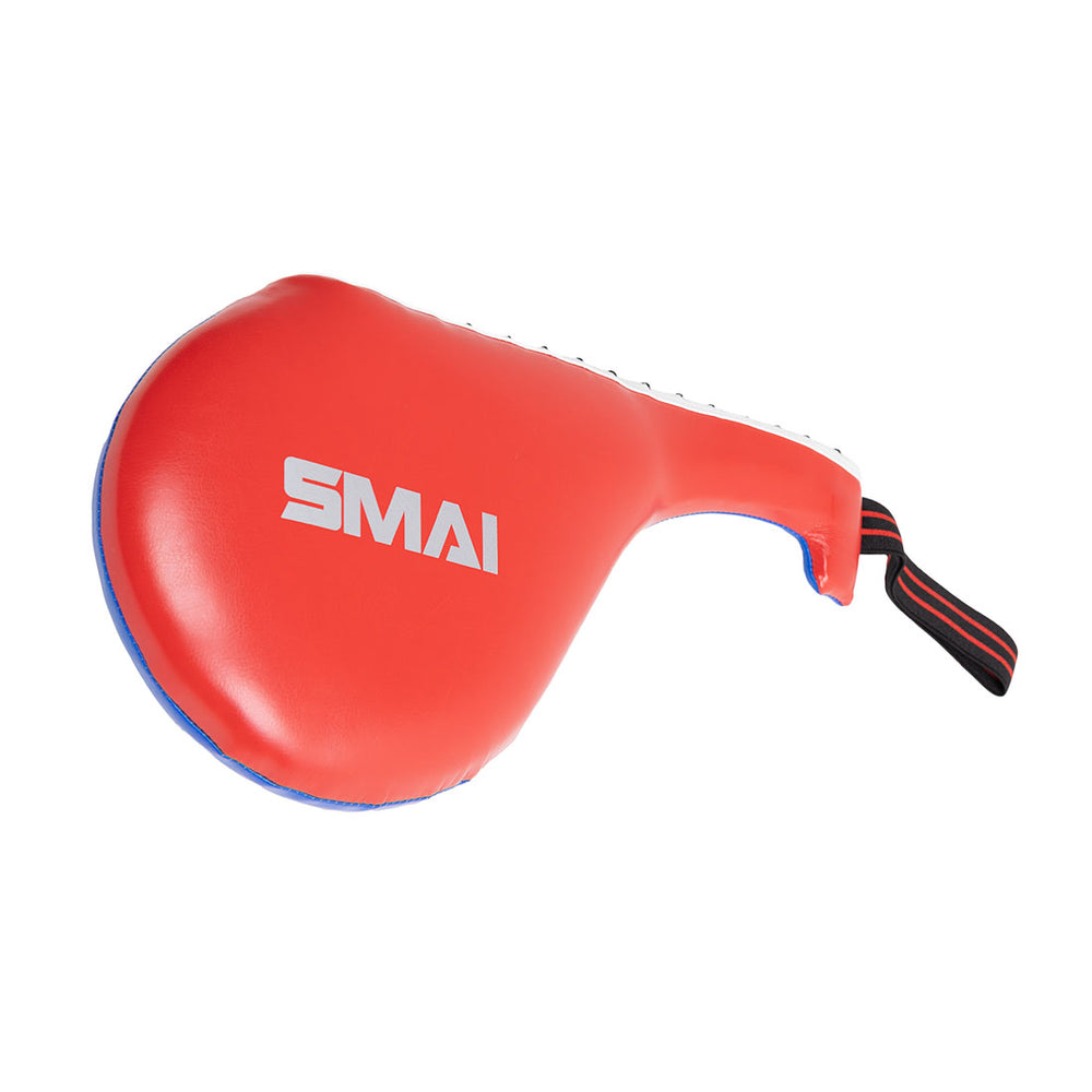 The SMAI TKD Single Kicking Paddle features a red body, blue trim, and a black and red wrist strap. The brand name "SMAI" is printed in white—ideal for children's training drills and single paddle practice.