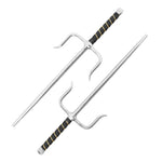 The SMAI Sai - Steel Chrome Rounded features two traditional Okinawan weapons with chrome steel blades and black, gold-accented handles—displayed side by side, one up and one down—ideal for martial arts training.