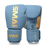 Introducing the SMAI Gold Series Boxing Glove in Light Blue/Gold: featuring gold accents and the "SMAI" logo printed in gold on the top and wrist straps. Designed for superior wrist support, these gloves are displayed upright to showcase both front and side views.