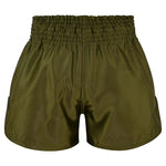 SMAI Muay Thai Shorts - Olive Green featuring a wide, gathered elastic waistband in a unisex fit.