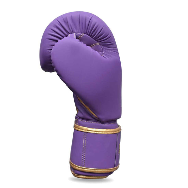 The SMAI Gold Series Boxing Glove in Purple/Gold is displayed upright against a white background, emphasizing its outstanding wrist support for enhanced stability.