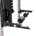 Close-up of the SMAI All in 1 Functional Trainer leg attachment, featuring two padded rollers, adjustable height, and a weight stack—perfect for leg exercises and strength training in any home gym.