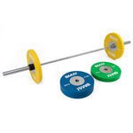An SMAI-branded Competition Bumper Plate Set, totaling 90 kg, is prepared for Olympic Weightlifting. It includes yellow 15 kg weight plates loaded on a barbell and additional pairs of green 10 kg and blue 20 kg plates nearby. These are ideal companions for Elite Bearing Barbells in any serious lifting session.