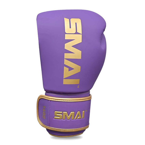 Introducing the SMAI Gold Series Boxing Glove in Purple/Gold, featuring gold accents and bold “SMAI” branding printed in gold on both the glove and wrist strap. Designed to deliver enhanced wrist support, this glove offers added stability throughout your training sessions.