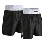 Two pairs of SMAI Boxing Competition Shorts - Black, each with white extra-wide elastic waistbands, side slits, and a small rectangular "SMAI" logo in black, red, and white on the waistband.