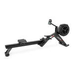 Black SMAI AirMag X Rower with an air resistance flywheel and a digital display monitor.