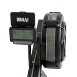 Digital display console and fan housing of an SMAI AirMag X Rower with hybrid air magnetic resistance.
